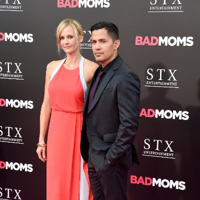 Daniella Deutscher and her husband, Jay Hernandez posing for a photo shoot. ok do it